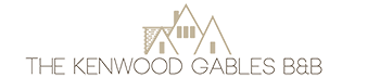 A black and white logo of a house.